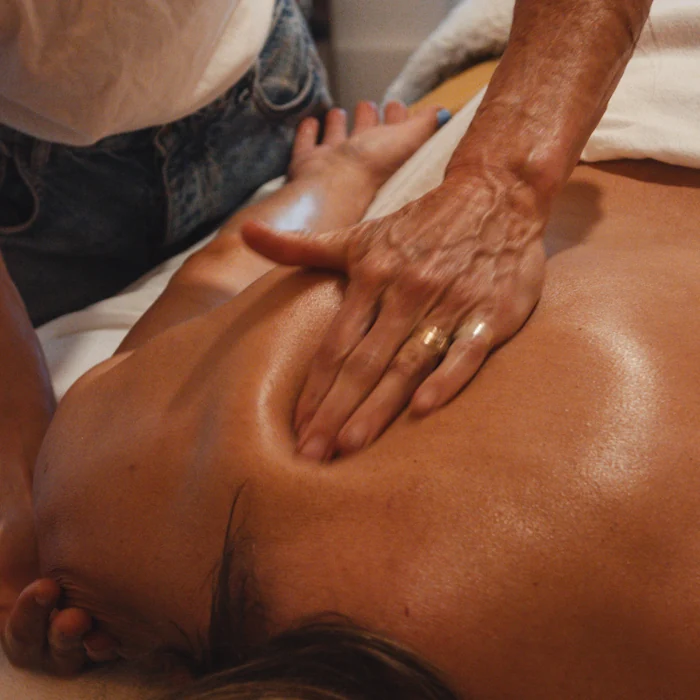 Client receiving a back massage